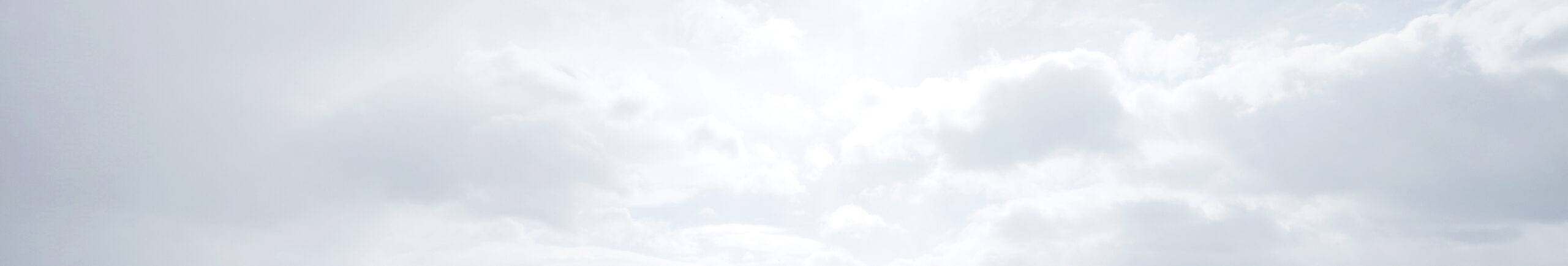 White cloudy bright sunny sky background banner